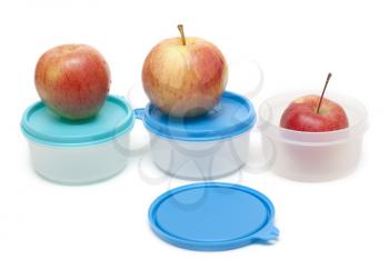 Royalty Free Photo of Apples and Containers