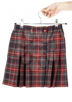 Royalty Free Photo of a Person Holding a Plaid Skirt