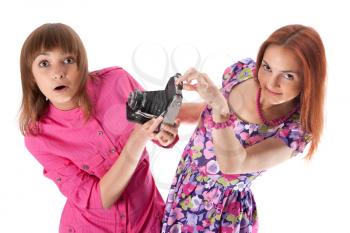 Royalty Free Photo of Two Girls Holding an Analog Camera