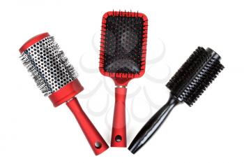 Royalty Free Photo of Three Hairbrushes