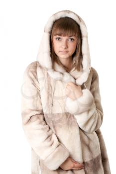 Royalty Free Photo of a Young Girl in a Fur Coat