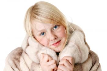 Royalty Free Photo of a Young Girl in a Fur Coat