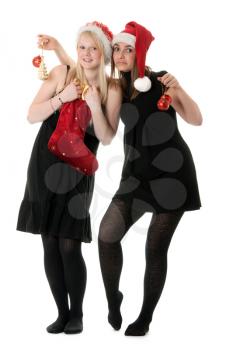 Royalty Free Photo of Two Girls With Christmas Decorations