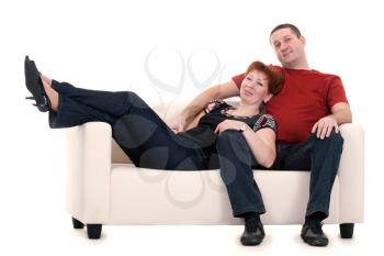 Royalty Free Photo of a Couple Sitting on a Couch