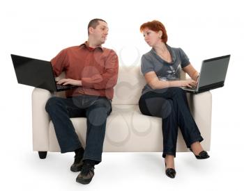 Royalty Free Photo of a Couple Sitting With Laptops