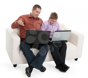 Royalty Free Photo of a Father and Son Using Laptops