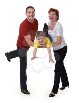 Royalty Free Photo of Parents Holding Their Son