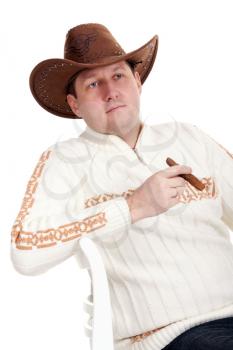 Royalty Free Photo of a Man in a Cowboy Hat