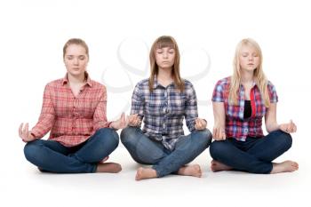 Royalty Free Photo of Three Girls Meditating