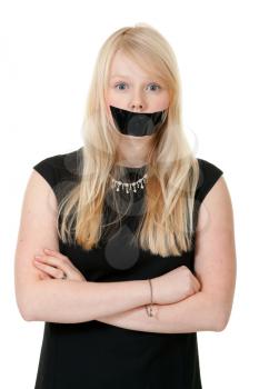 Royalty Free Photo of a Girl With Her Mouth Taped Shut