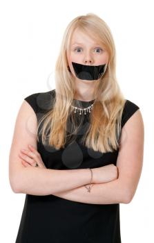 Royalty Free Photo of a Girl With Her Mouth Taped Shut