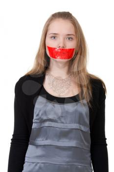 Royalty Free Photo of a Girl With Her Mouth Taped Close