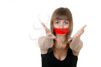 Royalty Free Photo of a Girl With Her Mouth Sealed
