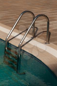 Royalty Free Photo of a Staircase in a Pool