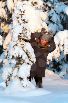 Royalty Free Photo of a Young Woman in a Winter Forest