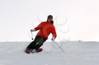 Royalty Free Photo of a Man Skiing on a Mountain