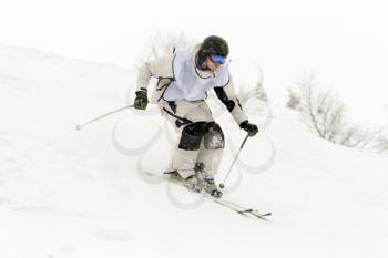 Royalty Free Photo of a Man Skiing on a Mountain