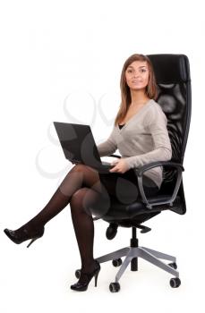 Royalty Free Photo of a Young Woman Using a Laptop
