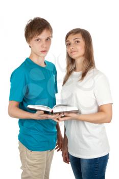 Royalty Free Photo of Two Teenagers Holding a Book