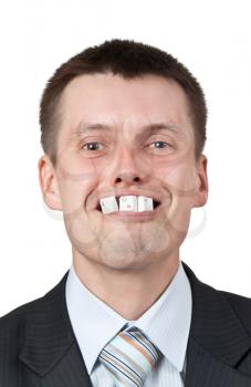 Royalty Free Photo of a Businessman With Computer Keys in His Mouth
