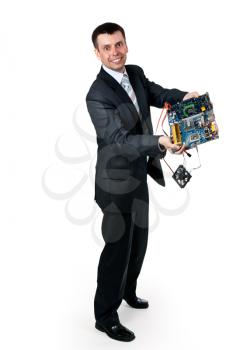 Royalty Free Photo of a Businessman Holding a Broken Computer