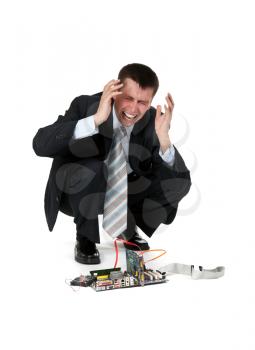 Royalty Free Photo of a Businessman Crying Over a Broken Computer