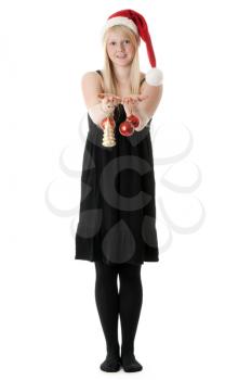 Royalty Free Photo of a Young Girl Holding Christmas Ornaments