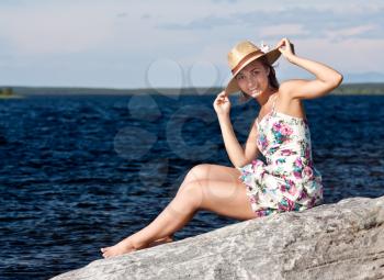 Royalty Free Photo of a Woman by the Lake