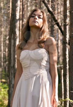 Royalty Free Photo of a Young Woman in a Forest