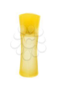 Yellow perfume bottle isolated on white background