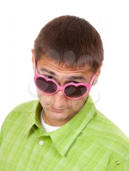 Close-up portrait of a man in pink sunglasses in a fun setting. Isolate on white.