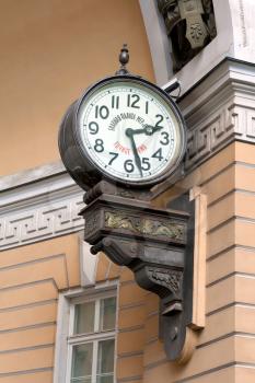 The clock on the wall at the Palace Square in St. Petersburg