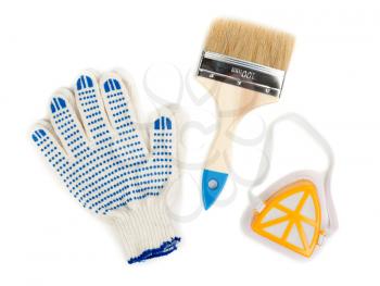 Still a pair of cotton gloves, paint brush and a dust mask.