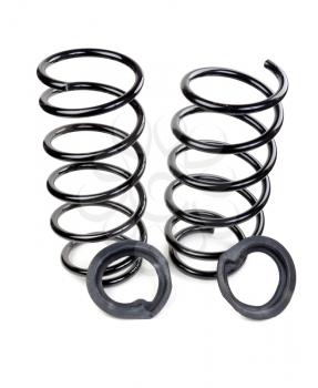 Set of two car springs and rubber spacers. Isolate on white.