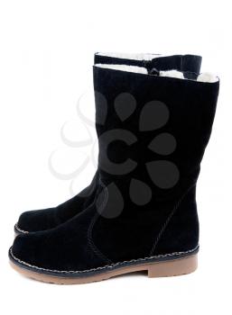 A pair of women's boots with fur on white background