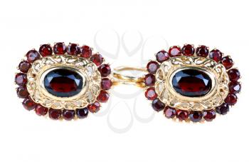 gold earrings with ruby ​​isolated on white