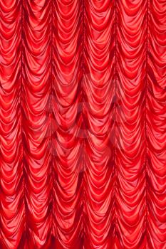 Brightly  red lit curtains for your background