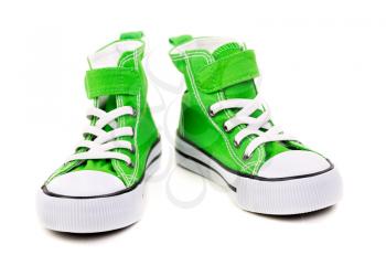 green sneakers with white laces isolated on white