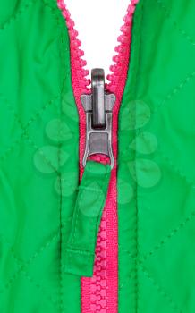 open pink zipper on the green jacket