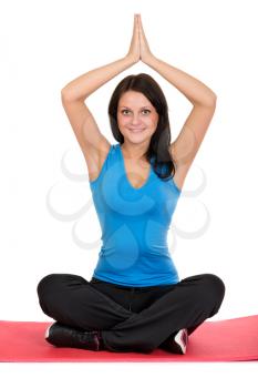 Beautiful girl doing yoga isolated on white background