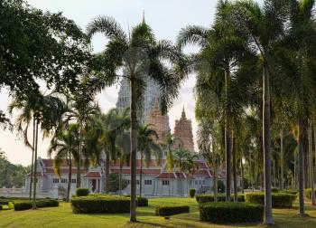 Wat Yan in Thailand in a park with palm trees