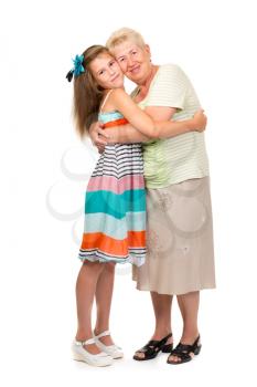 Grandmother with her granddaughter in the studio on a white isolate.