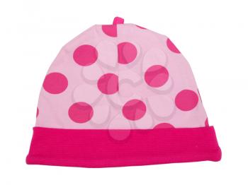 Pink baby hat with polka dots on a white background