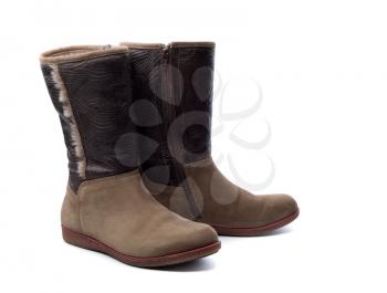 Pair of leather women's boots with fur. Isolate on white.