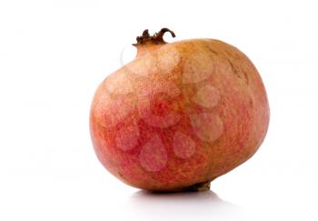 Ripe red pomegranate, isolate on white background.