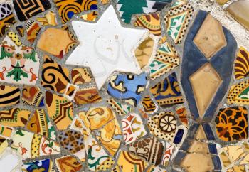 Close-up of the ceramics in Park Guell Barcelona created by Antonio Gaudi.