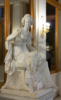 Marble monument seated woman. In the Hermitage Museum.