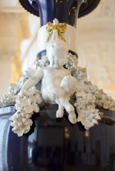 Marble boy with hooves on the ancient vase in the Hermitage Museum, St. Petersburg.