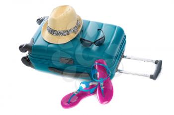 Blue plastic bag, straw hat, sunglasses and beach shales. Isolate on white background.