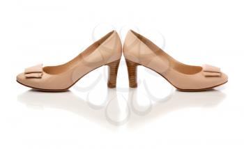 Pair of beige leather fashion women's shoes. Isolate.